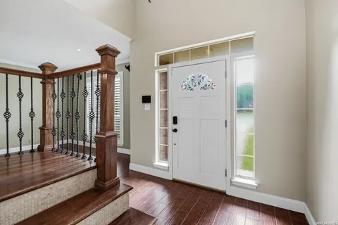 a view of entryway with wooden floor