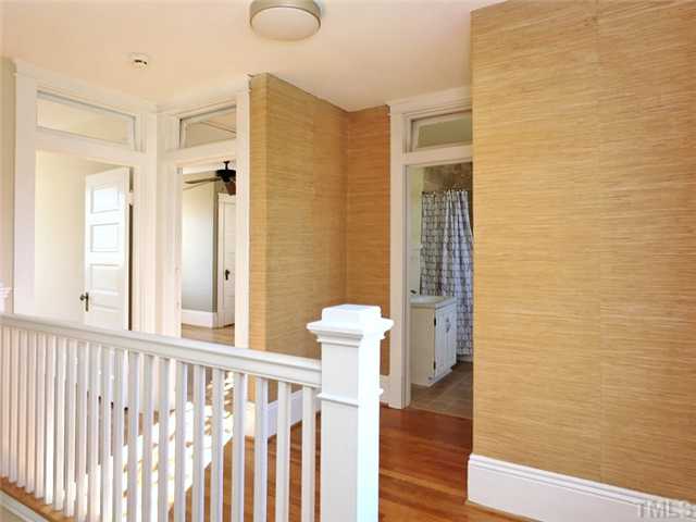 1413 Scales Street Raleigh, NC 27608 - Photo 18 of 24 a bathroom with a sink and a mirror