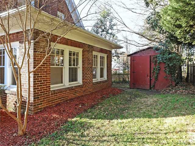 1413 Scales Street Raleigh, NC 27608 - Photo 23 of 24 a view of a house with a yard