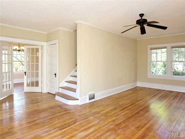 1413 Scales Street Raleigh, NC 27608 - Photo 6 of 24 a view of an entryway with wooden floor and door