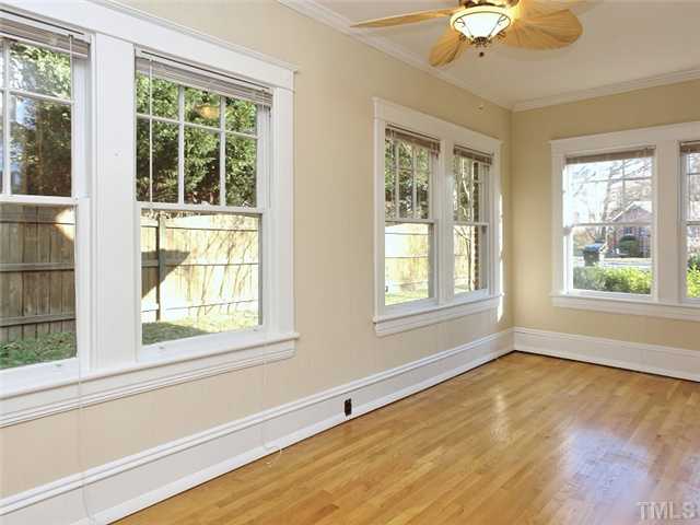 1413 Scales Street Raleigh, NC 27608 - Photo 8 of 24 a view of an empty room with a window