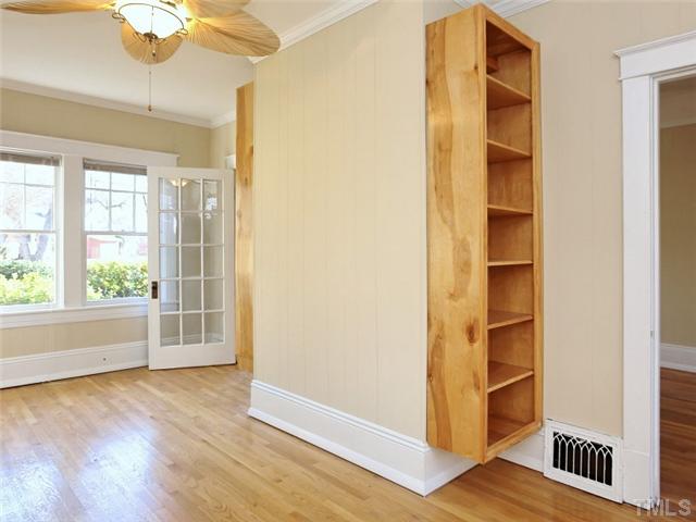 1413 Scales Street Raleigh, NC 27608 - Photo 10 of 24 a view of an empty room with a window