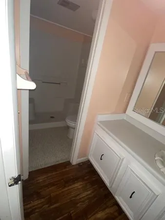 a view of an empty walk in closet