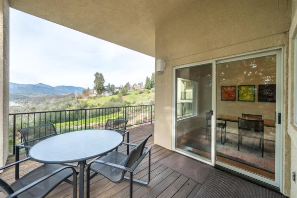 a view of a town with mountains in the background