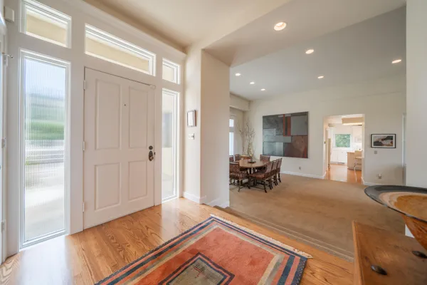 a living room with furniture and a table
