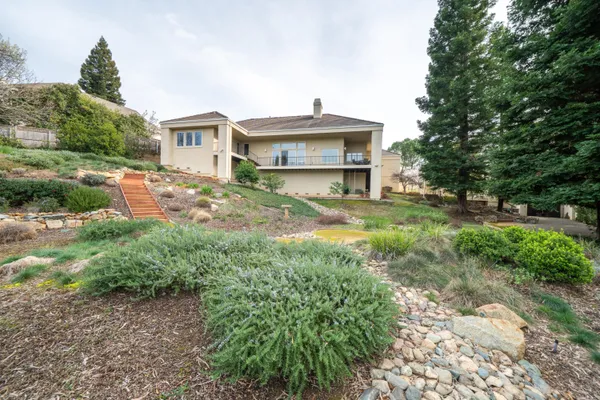 a view of a mountain with a garden
