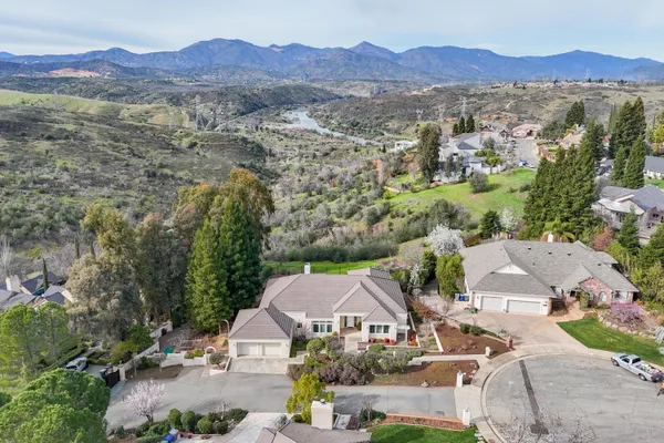 an aerial view of a city with lots of residential buildings