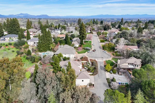 an aerial view of a house with outdoor space