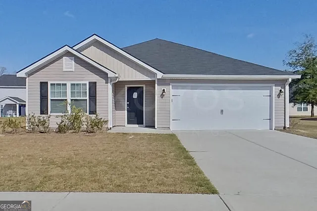 front view of house with a yard