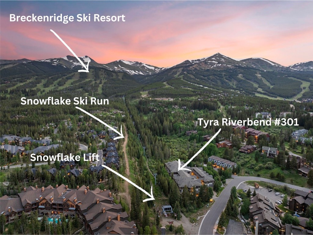 655 4 O Clock Road, Unit 301 Breckenridge, CO 80424 - Photo 1 of 23 a view of a city with a mountain in the background