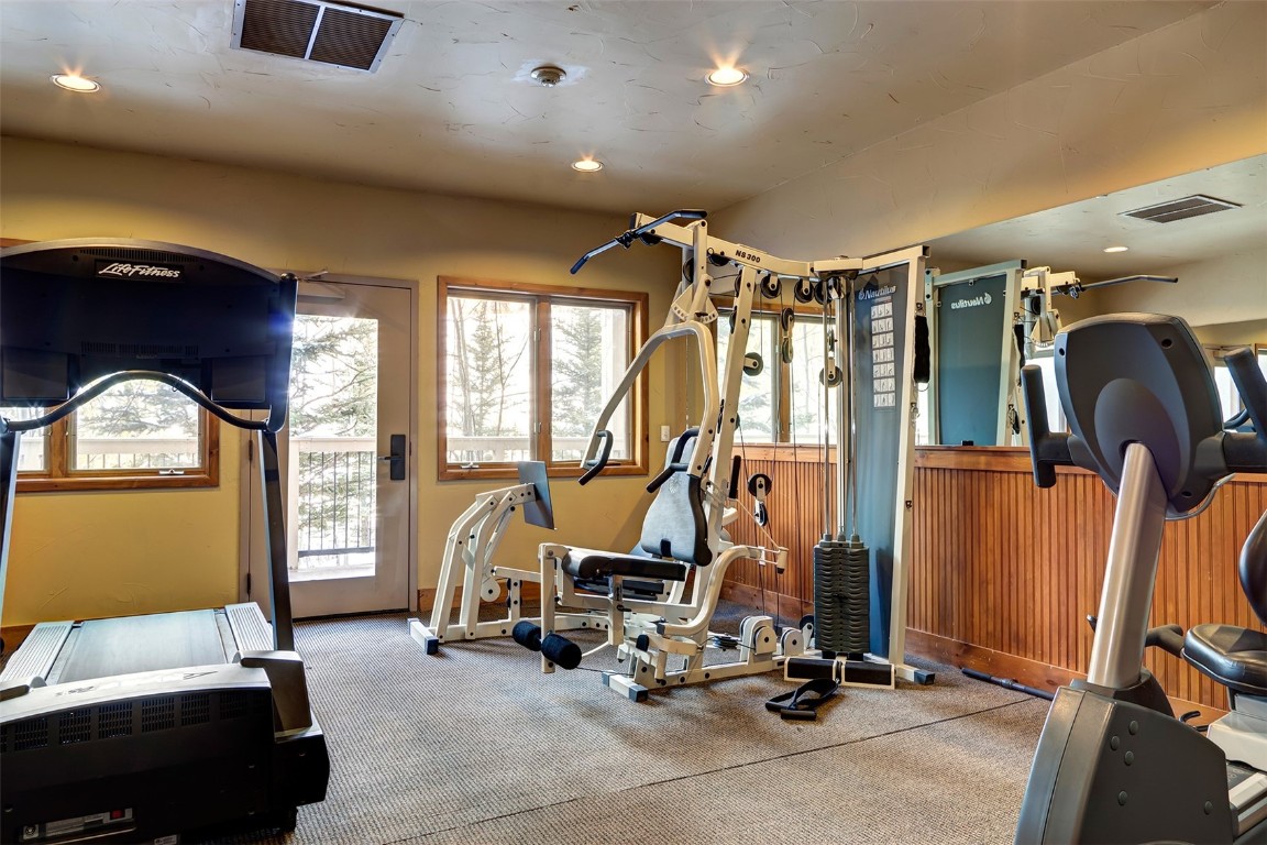 655 4 O Clock Road, Unit 301 Breckenridge, CO 80424 - Photo 13 of 23 a view of a room with gym equipment