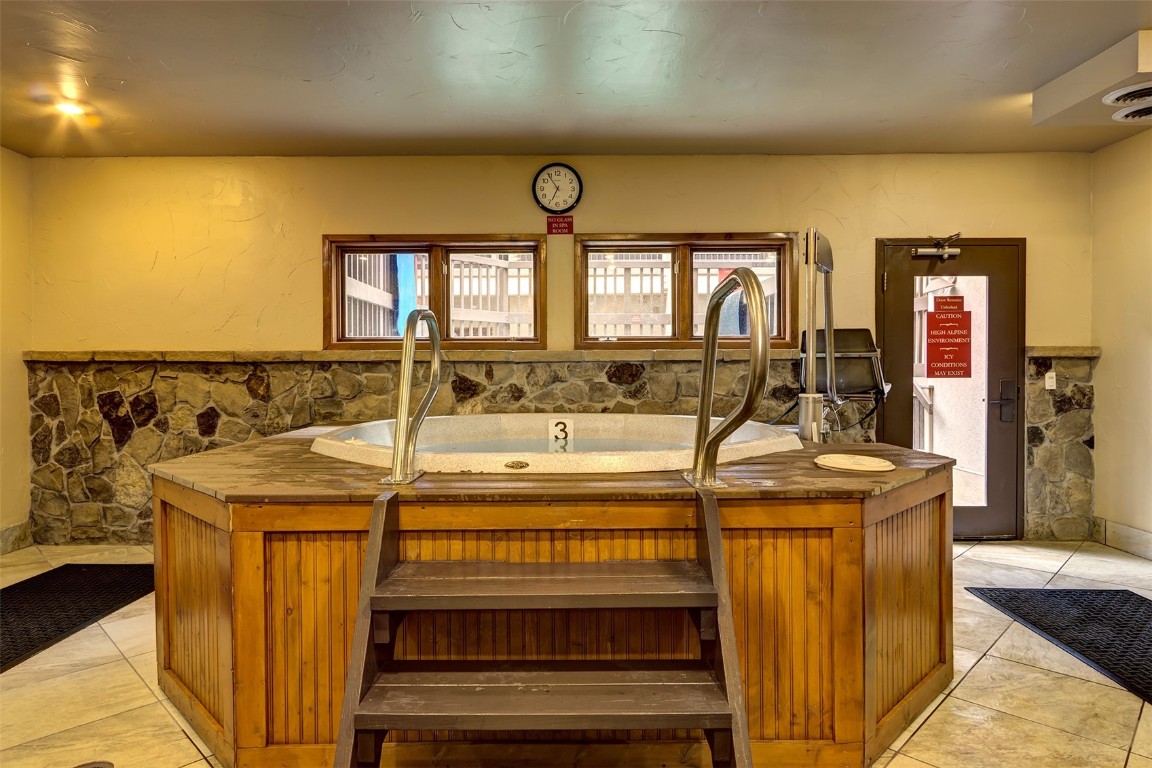 655 4 O Clock Road, Unit 301 Breckenridge, CO 80424 - Photo 15 of 23 a view of a bath tub sitting in a bathroom
