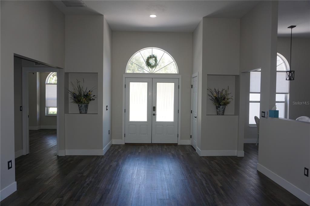 6722 Southwest 111th Loop Ocala, FL 34476 - Photo 6 of 51 VIEW FROM LIVING ROOM TO FRONT DOOR