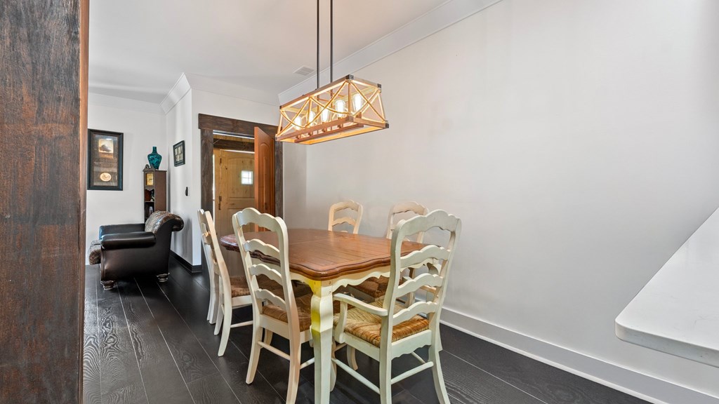 610 Madola Road Epworth, GA 30541 - Photo 4 of 16 a view of a dining room with furniture and chandelier