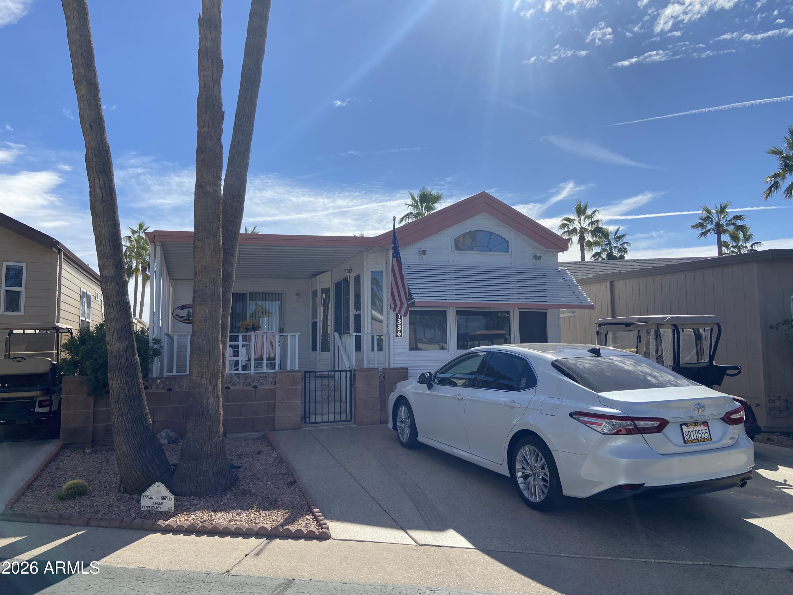 1336 West Inuit Avenue, Unit 336 Apache Junction, AZ 85119 - Photo 34 of 35 a house view with a outdoor space