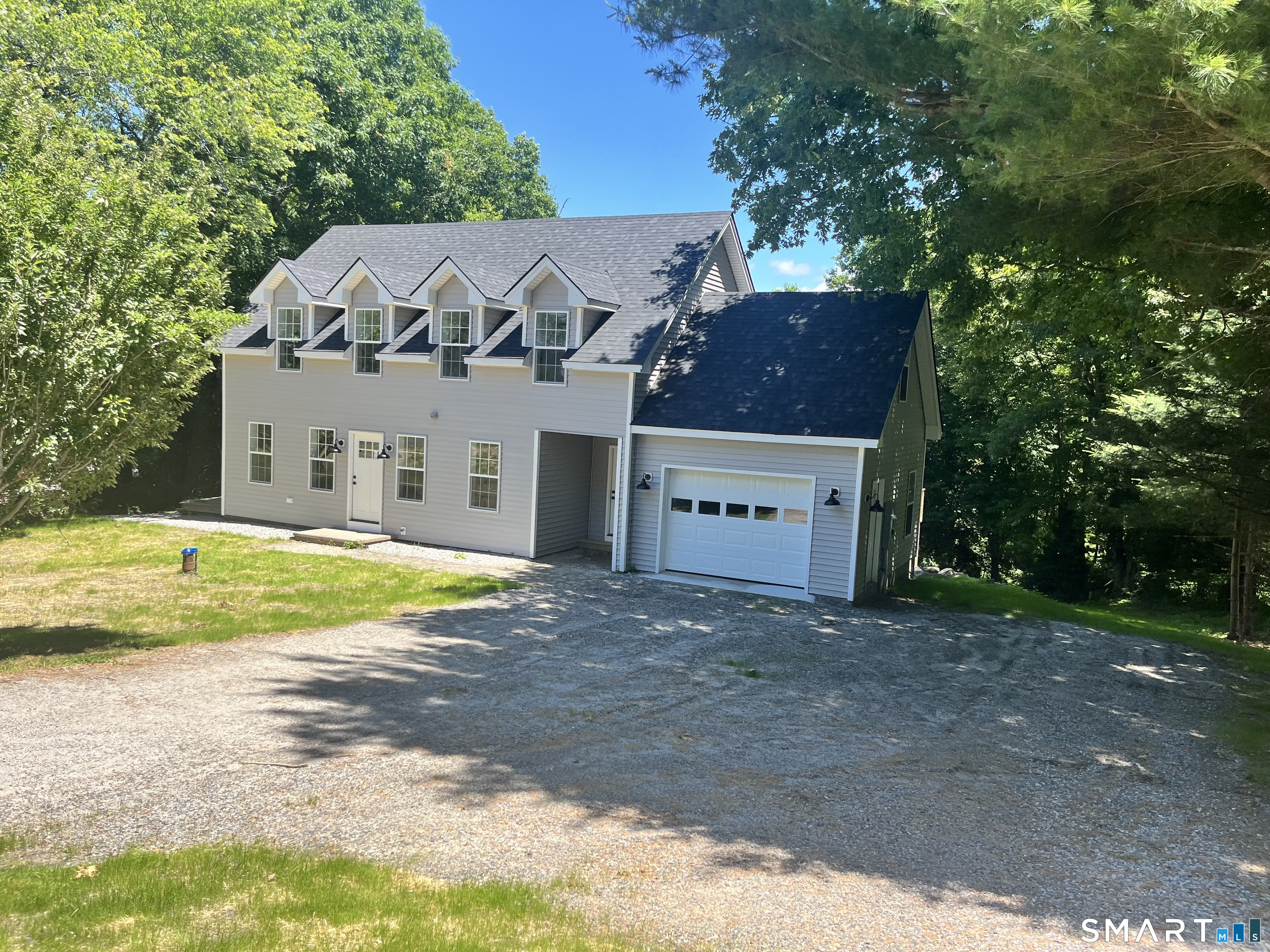 100 Wild Cat Hill Road Harwinton, CT 06791 - Photo 2 of 37 a view of house with a swimming pool