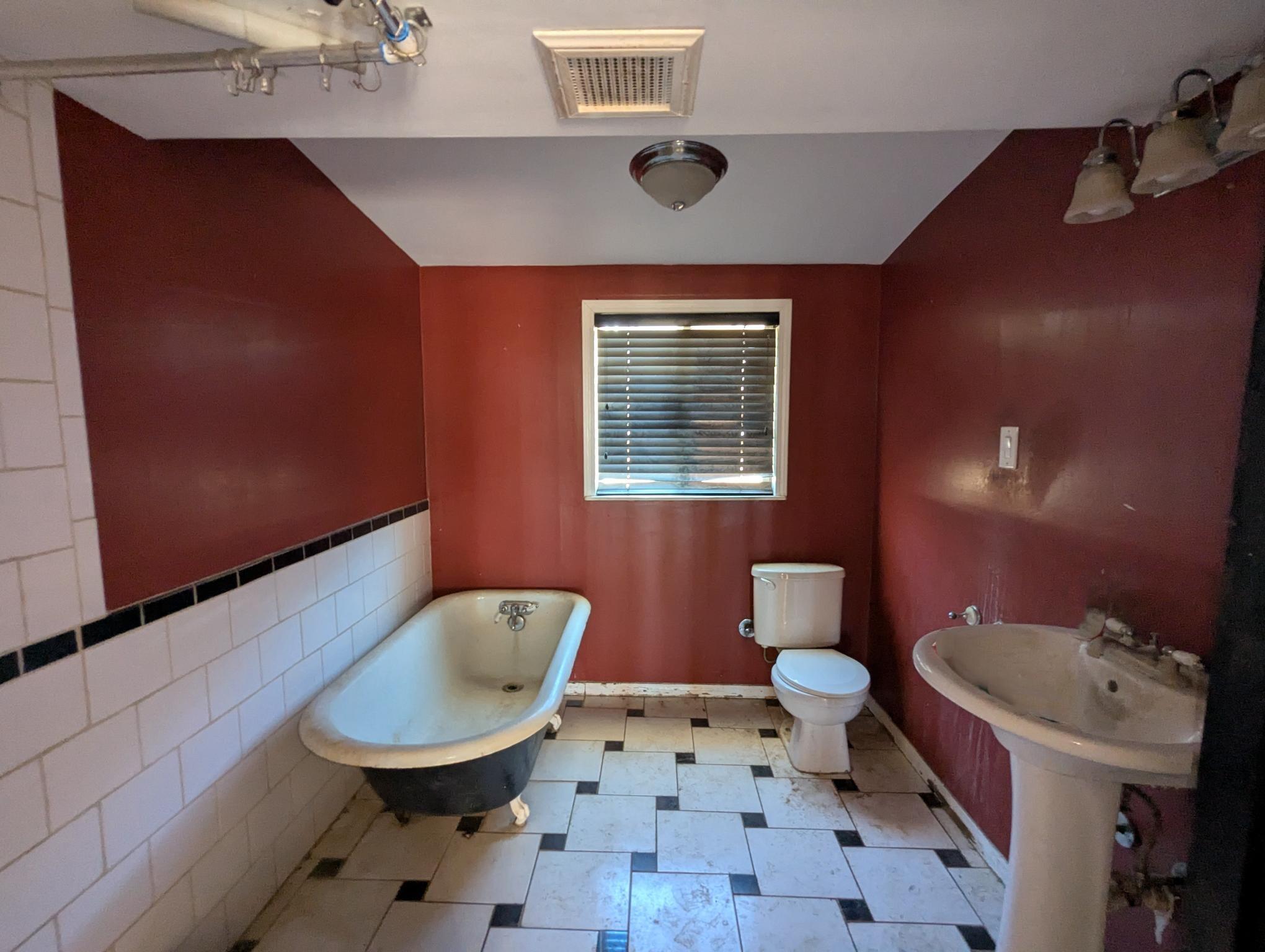 58841 Granite Gulley Road Anza, CA 92539 - Photo 11 of 18 a bathroom with a sink mirror bathtub and toilet