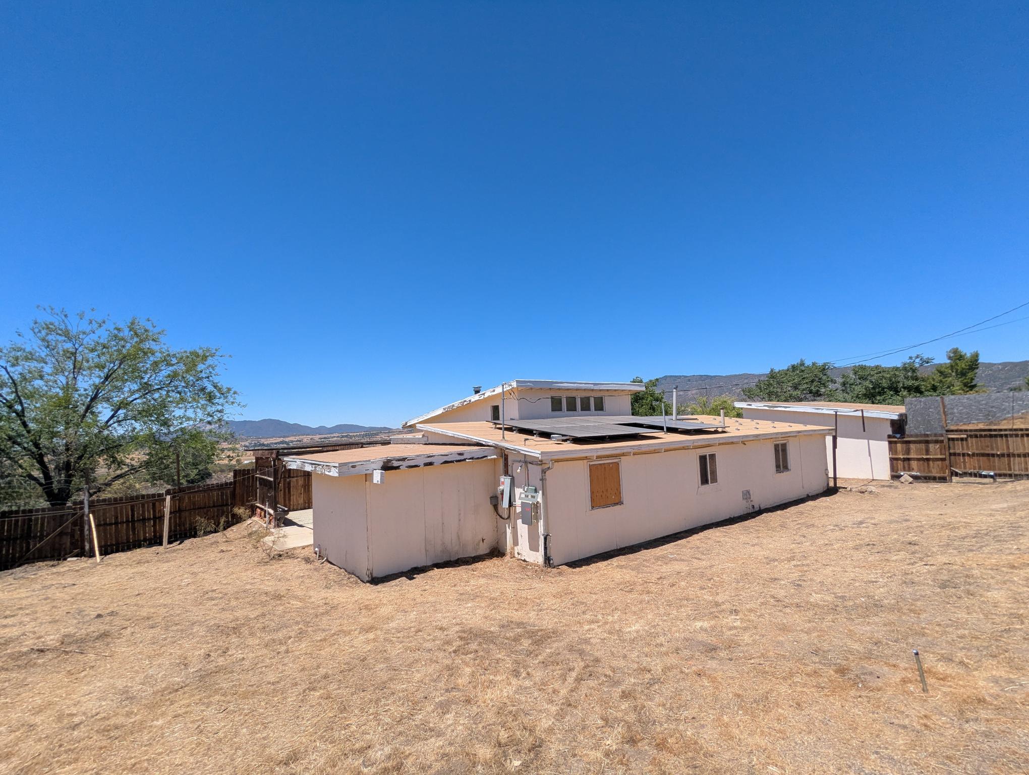 58841 Granite Gulley Road Anza, CA 92539 - Photo 16 of 18 a view of a kitchen with a stove