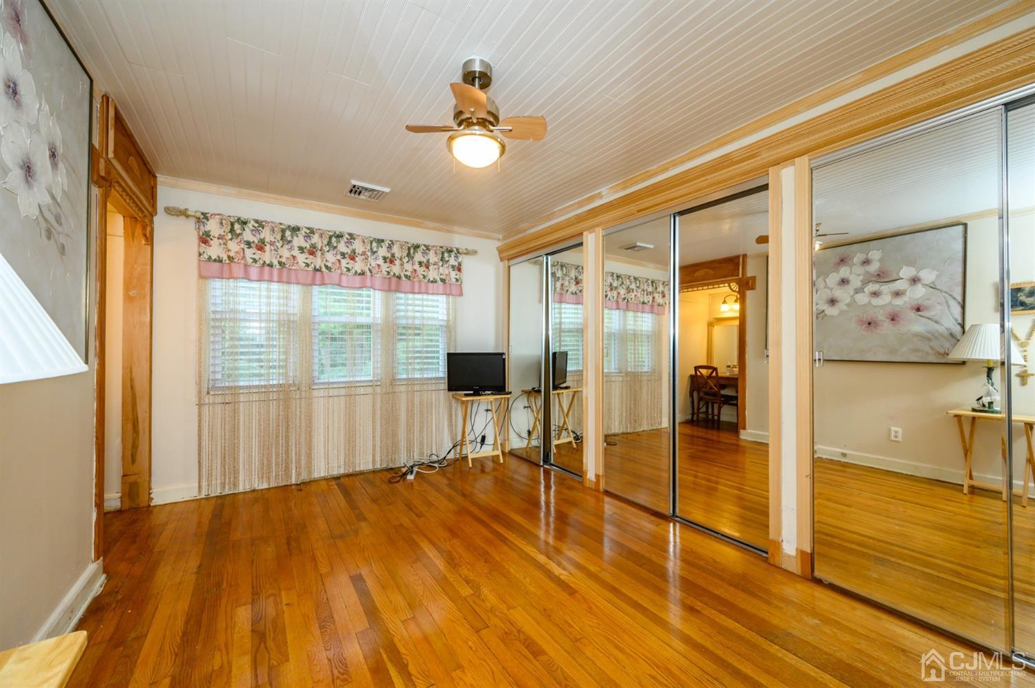 10 Stiles Road Warren, NJ 07059 - Photo 20 of 39 a room with wooden floor and balcony