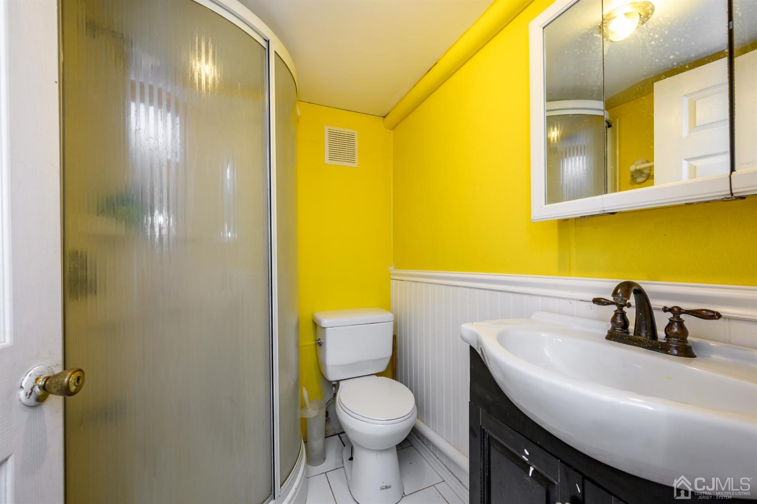 10 Stiles Road Warren, NJ 07059 - Photo 31 of 39 a bathroom with a sink and a toilet