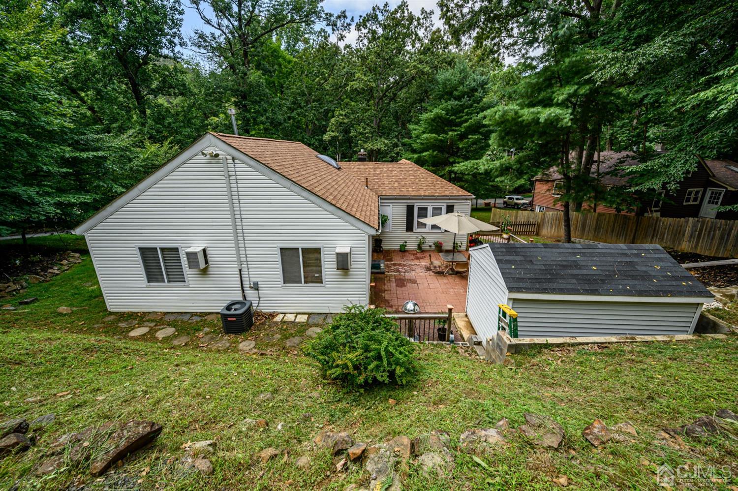 10 Stiles Road Warren, NJ 07059 - Photo 37 of 39 a house view with a garden