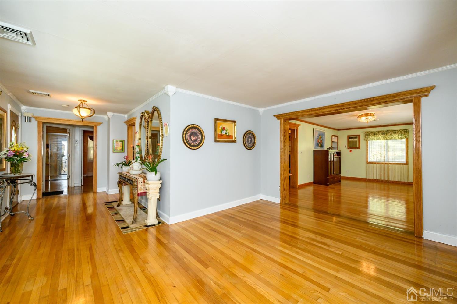 10 Stiles Road Warren, NJ 07059 - Photo 6 of 39 a view of a livingroom with wooden floor