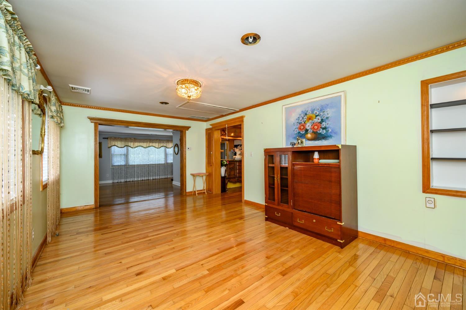 10 Stiles Road Warren, NJ 07059 - Photo 10 of 39 a view of empty room with wooden floor