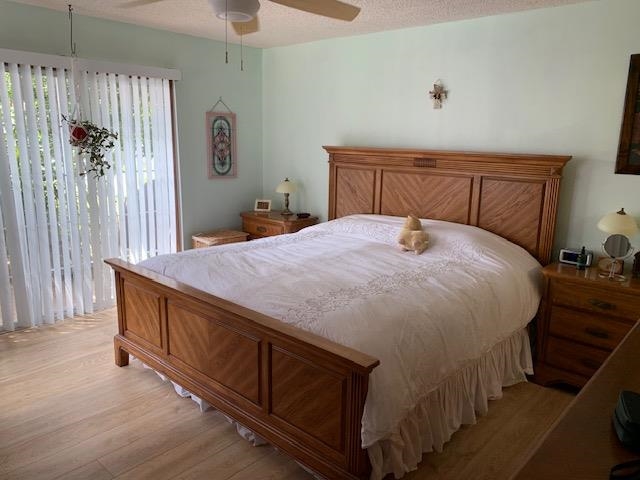 6325 Salado Road St. Augustine, FL 32080 - Photo 18 of 28 a bed sitting in a bedroom next to a window