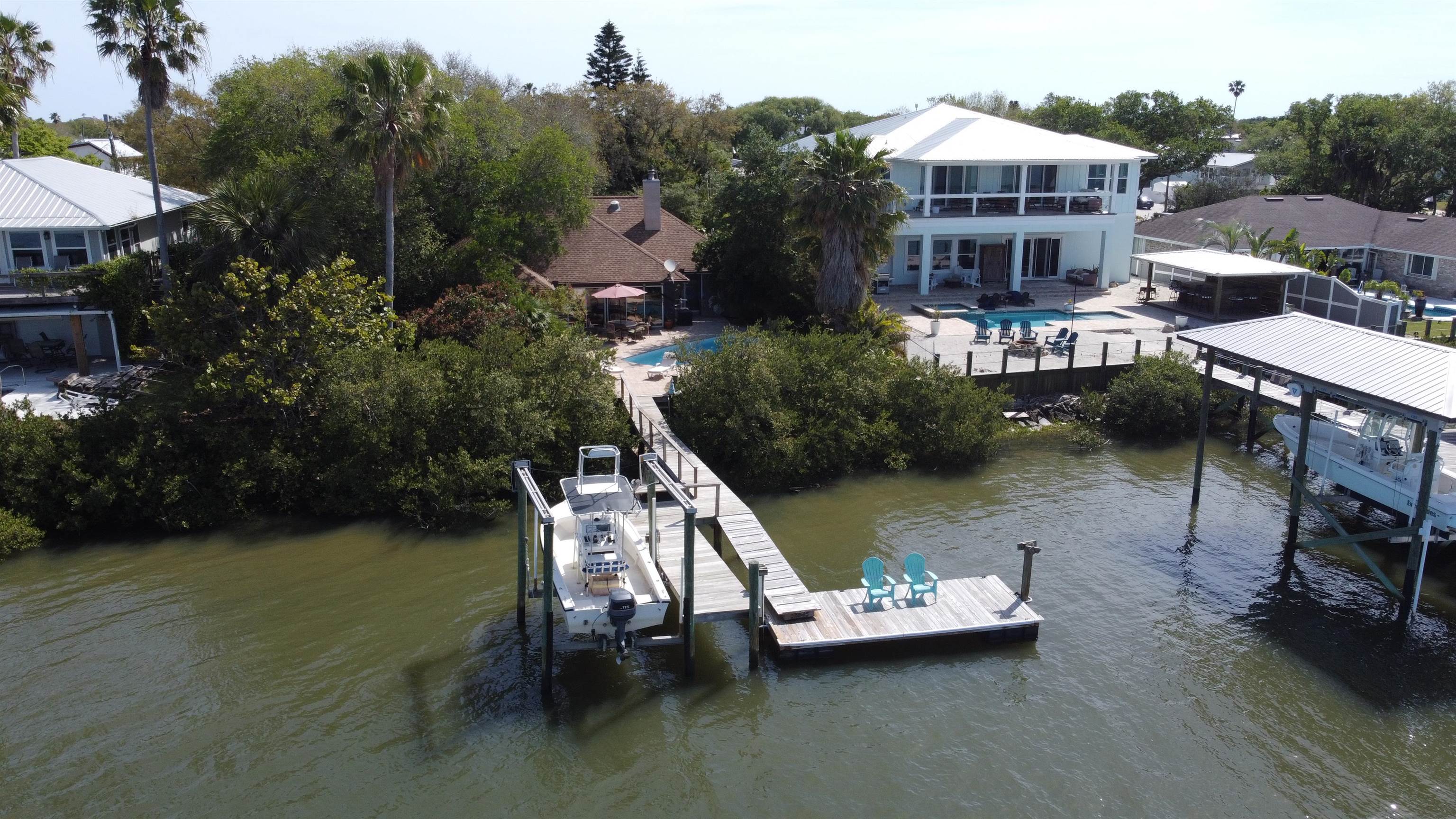 6325 Salado Road St. Augustine, FL 32080 - Photo 25 of 28 an aerial view of a house with swimming pool garden and patio