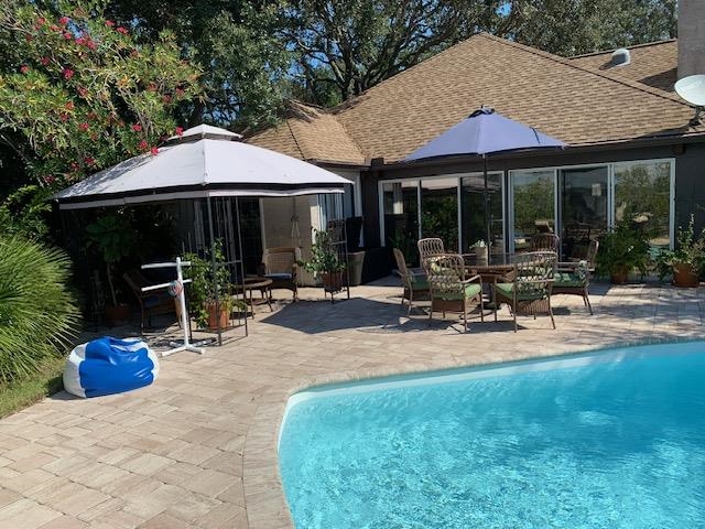 6325 Salado Road St. Augustine, FL 32080 - Photo 8 of 28 a view of a house with sitting area and furniture