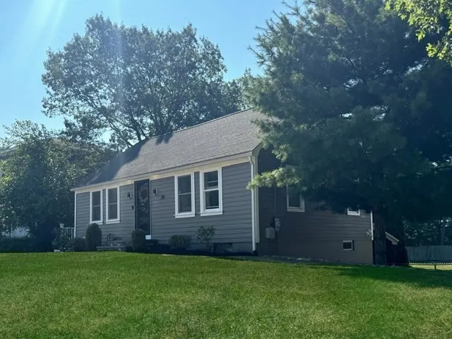 a backyard of a house with lots of green space