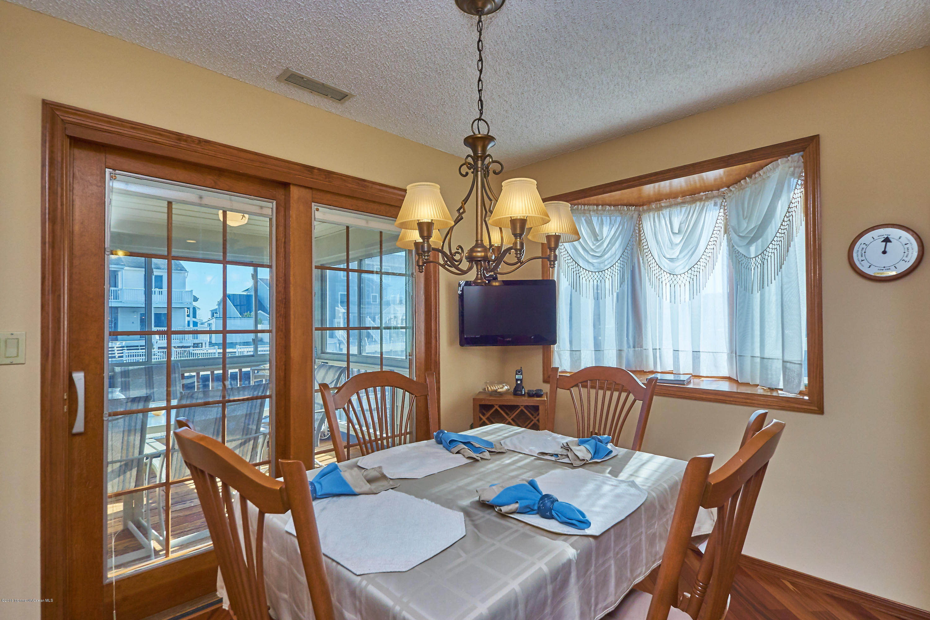 132 Peter Road Manahawkin, NJ 08050 - Photo 12 of 36 a view of a dining room with furniture window and outside view