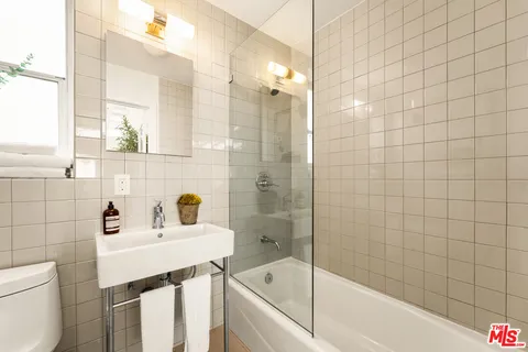 a bathroom with a sink and a bathtub