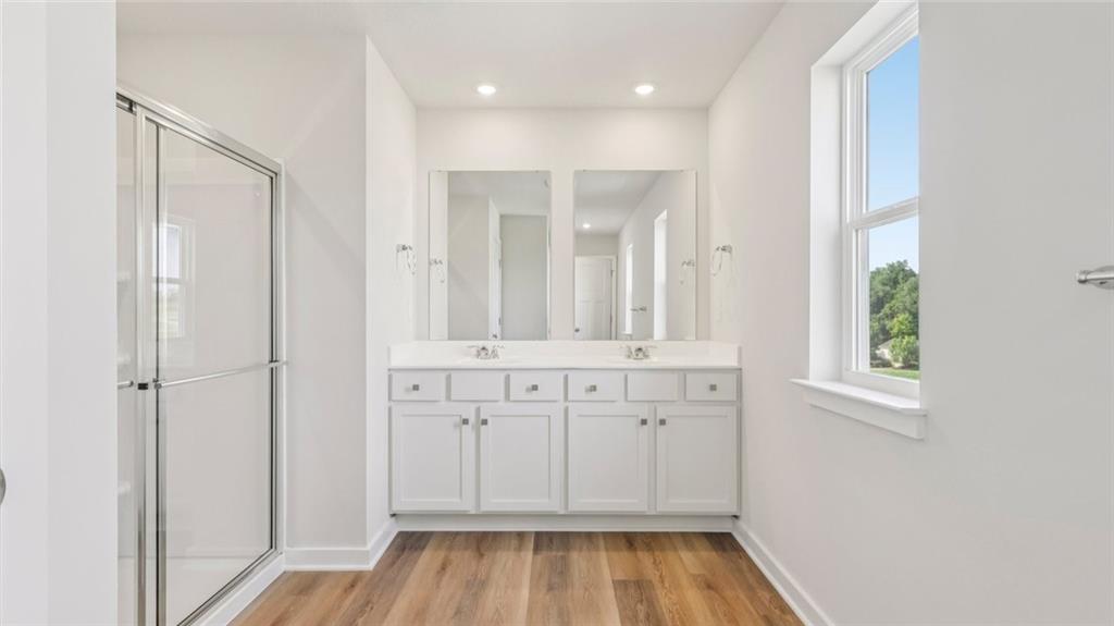 306 St Michael Way Imperial, PA 15126 - Photo 8 of 13 a view of a bathroom with a tub and shower