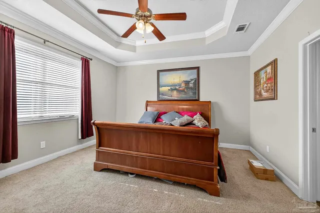a room with furniture a refrigerator and a window