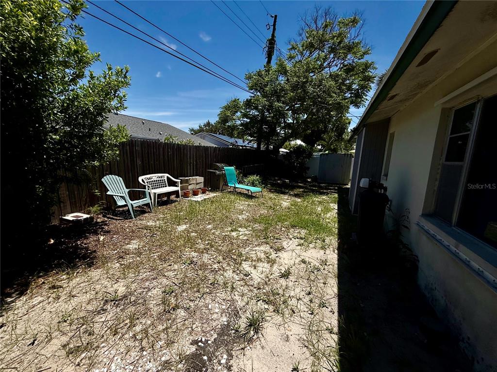 1004 Connecticut Road Tarpon Springs, FL 34689 - Photo 45 of 57 a view of yard with seating space
