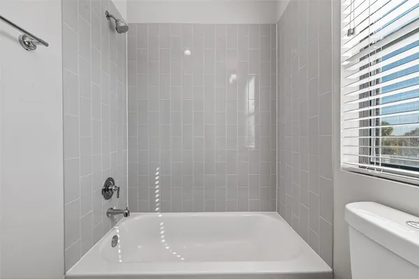 a bathroom with a bathtub