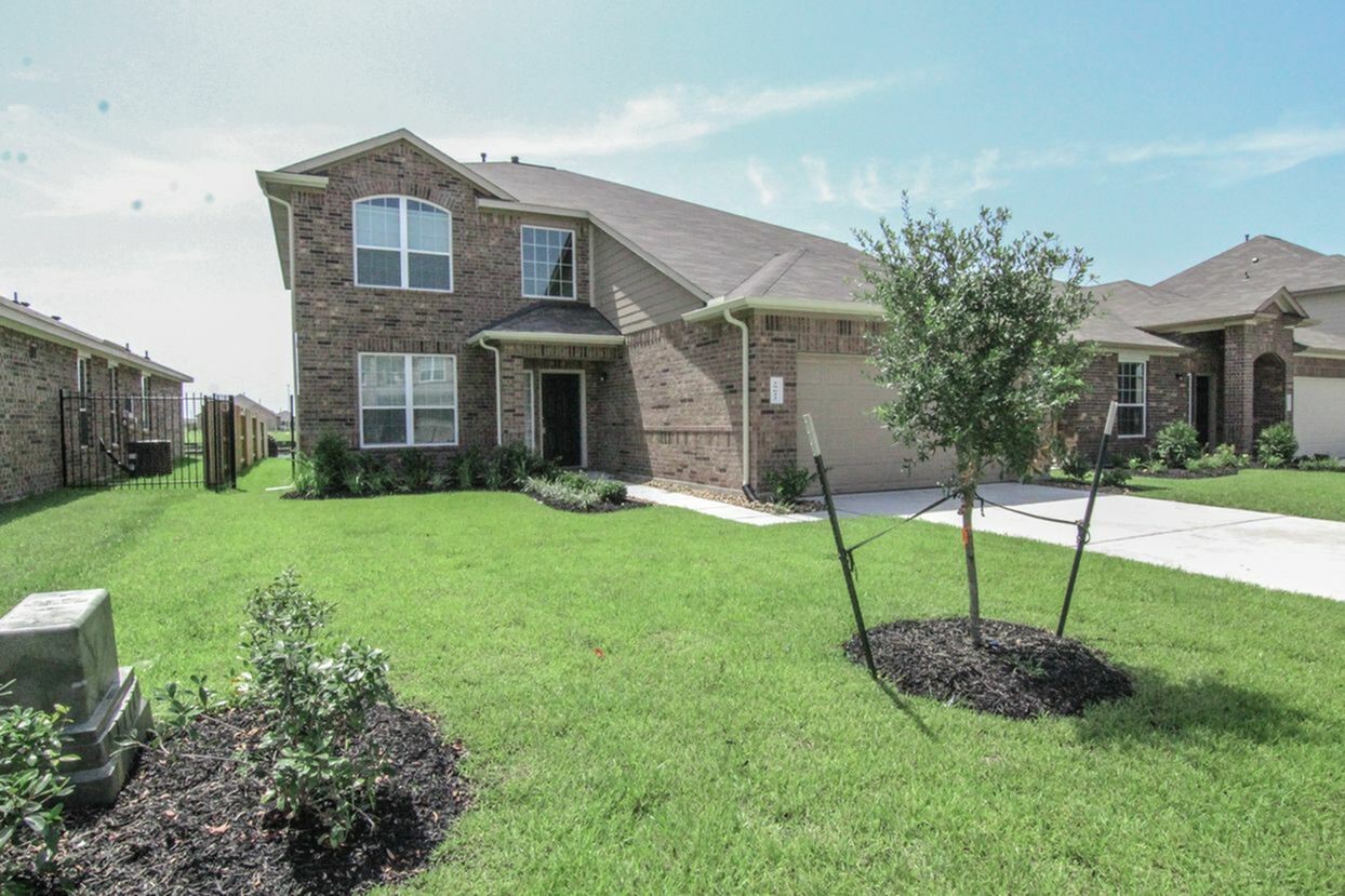 29622 Clover Shore Drive Spring, TX 77386 - Photo 3 of 20 a front view of a house with a yard