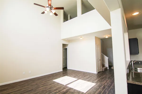 a view of a kitchen from the hallway