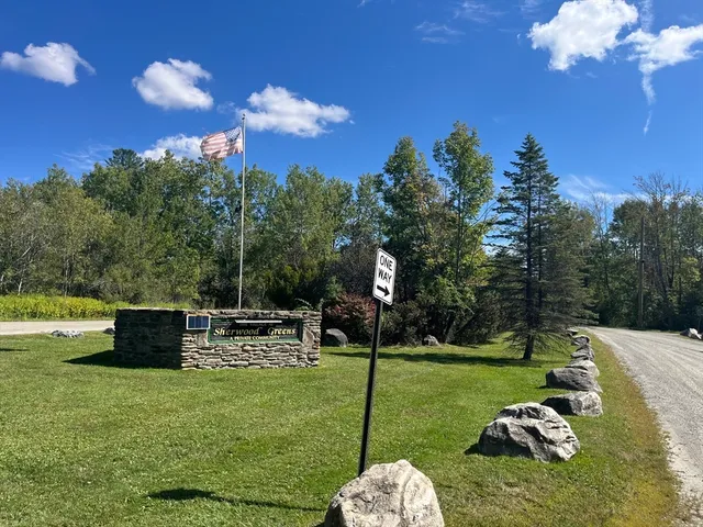 a view of a garden with an outdoor space