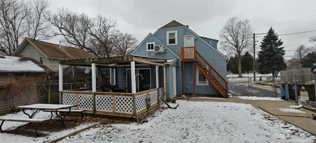 a view of a house with a snow on the wall