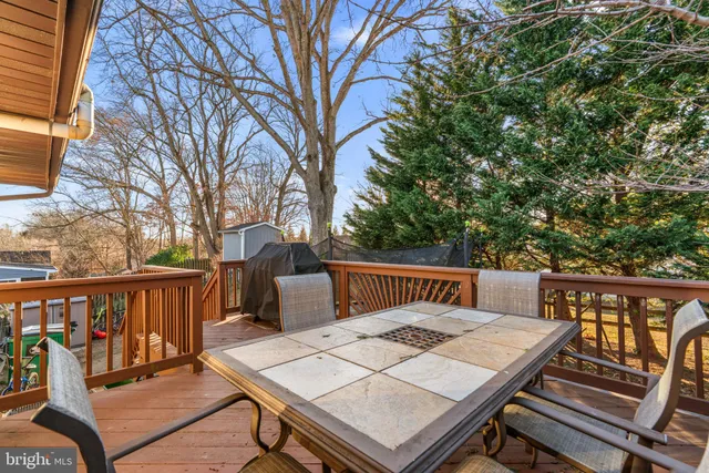 a view of a patio with wooden floor