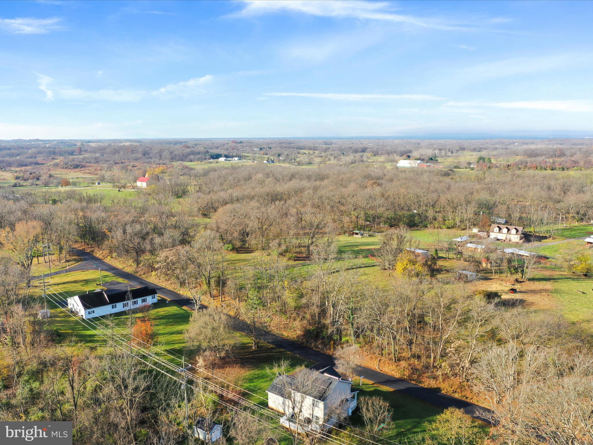 1150 Lewisville Road Berryville, VA 22611 - Photo 46 of 50 an aerial view of residential building and lake