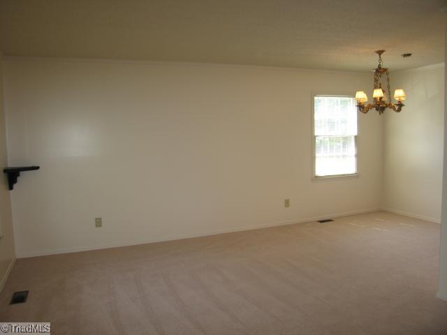 1906 Three Meadows Road Greensboro, NC 27455 - Photo 3 of 10 Dining Room. NEW Carpet and paint!