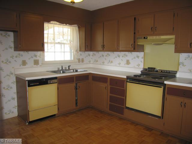 1906 Three Meadows Road Greensboro, NC 27455 - Photo 4 of 10 Kitchen. New paint on kitchen cabinets! New appliances negotiable!
