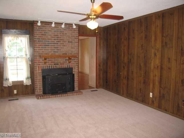 1906 Three Meadows Road Greensboro, NC 27455 - Photo 5 of 10 Den/Family/Great Room. Den with fireplace! New carpet!