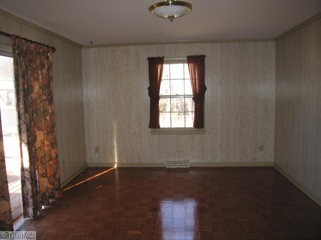 1906 Three Meadows Road Greensboro, NC 27455 - Photo 8 of 10 Other. 4th Bedroom has sliders that open on to deck and patio in the fenced back yard!