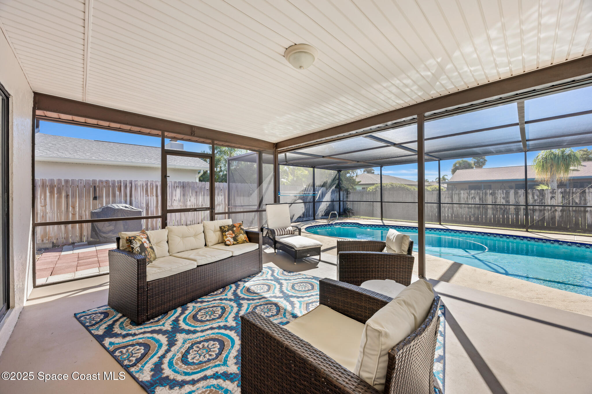419 Coach Road Satellite Beach, FL 32937 - Photo 10 of 37 Spacious Pool Side