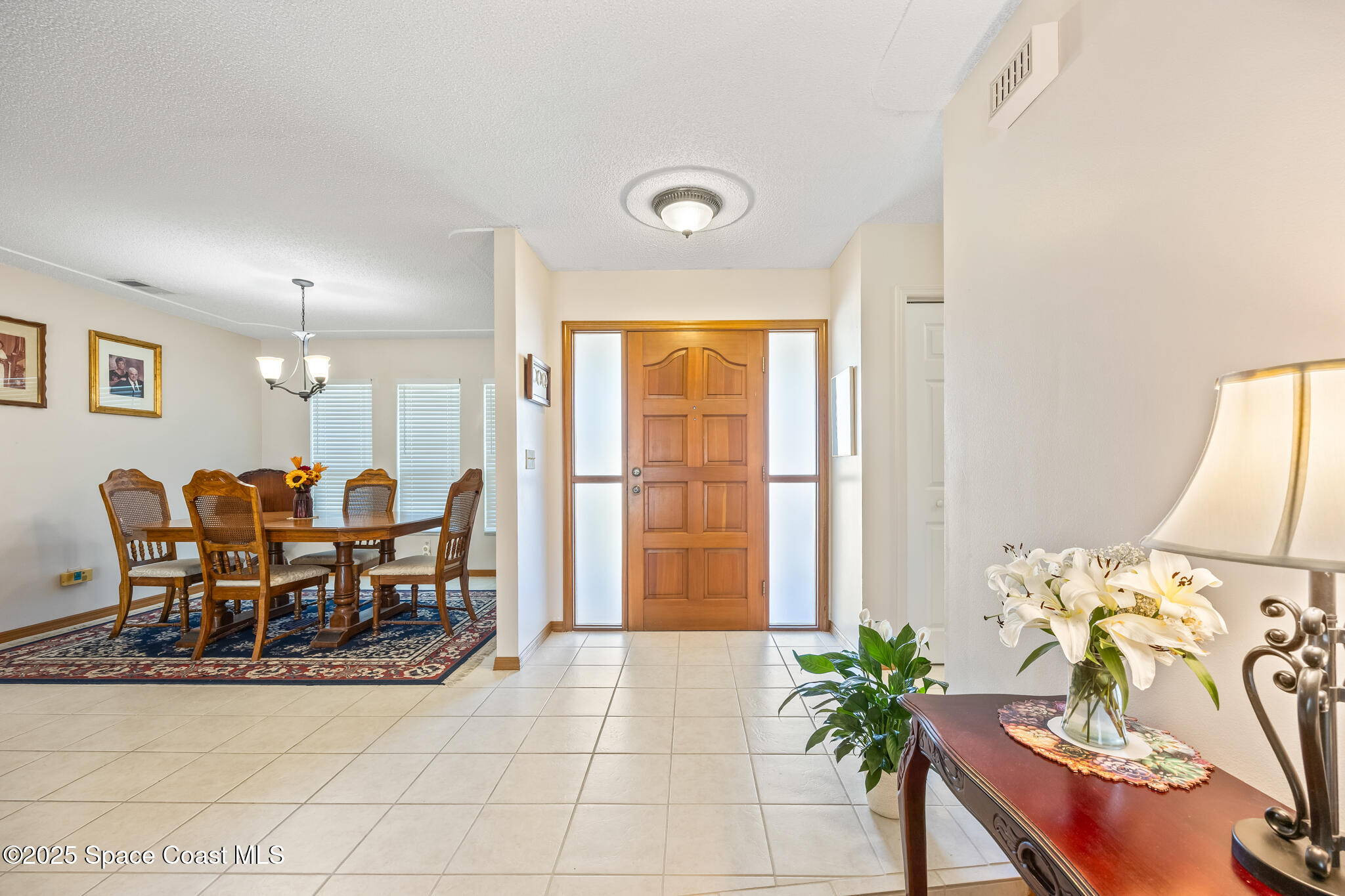 419 Coach Road Satellite Beach, FL 32937 - Photo 11 of 37 Entry & Formal Dining