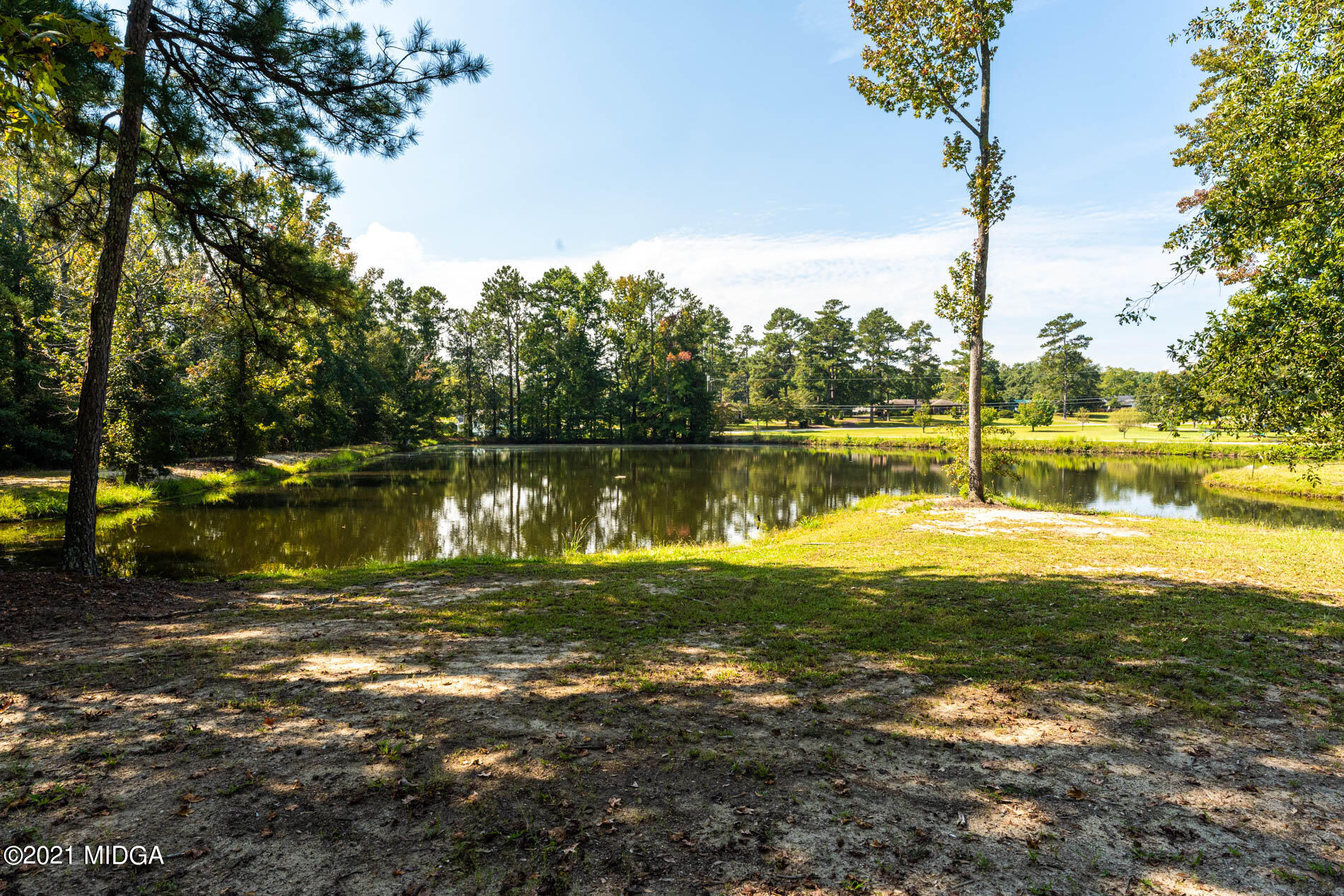 3368 Tidwell Road Lizella, GA 31052 - Photo 4 of 43 a view of a lake with a big yard